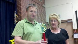 Claudia Cary, SACL’s volunteer liaison to Suburban Park Elementary presents SACL President Kevin Janney an Outstanding Partners in Education award for the civic league for the 2011-2012 school year.